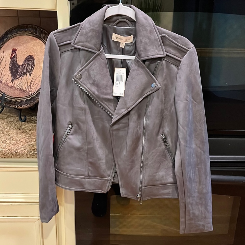Beautiful stylish is jacket.  Brand new with rage on it!!